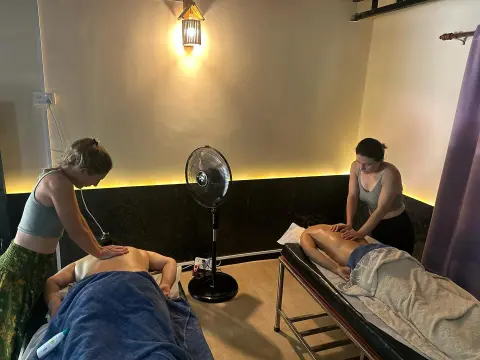 massage students practicing - diploma in massage